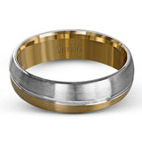 Boasting a modern two-tone design, this men's wedding band features elegant columns of brushed white and yellow separated by a sleek ribbon of smooth white gold.