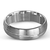 Boasting a modern two-tone design, this men's wedding band features elegant columns of brushed white and yellow separated by a sleek ribbon of smooth white gold.