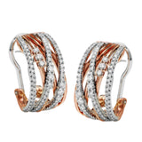 These striking two-tone gold earrings have a dynamic and overlapping design containing .96 ctw of scintillating white diamonds.