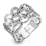 Featuring a romantic vintage-inspired design, this intricate, swirling white gold ring is accentuated by .35 ctw glistening round cut white diamonds.