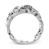 Featuring a romantic vintage-inspired design, this intricate, swirling white gold ring is accentuated by .35 ctw glistening round cut white diamonds.