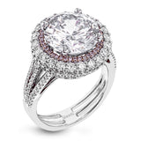 This 18k white and rose gold engagement ring is sure to turn heads with 1.09 ctw of white diamonds as well as .12 ctw of pink diamonds.