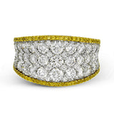 This bold statement ring is made from 18k rose and white gold and contains 2.01 ctw of white round brilliant diamonds as well as .23 ctw of pink diamonds.