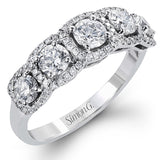 This eye-catching white gold modern band features multiple exquisite halos set with 1.33 ctw glistening round cut white diamond accents.