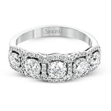 This eye-catching white gold modern band features multiple exquisite halos set with 1.33 ctw glistening round cut white diamond accents.