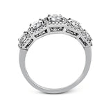 This eye-catching white gold modern band features multiple exquisite halos set with 1.33 ctw glistening round cut white diamond accents.