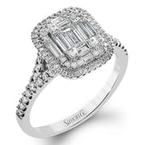 The modern style of this white gold ring is complemented by .48 ctw of glistening baguette cut white diamonds and .38 ctw of round cut white diamonds.