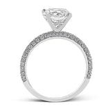 This absolutely exquisite white gold engagement ring dazzles the eye with round white diamonds.
