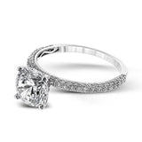 This absolutely exquisite white gold engagement ring dazzles the eye with round white diamonds.
