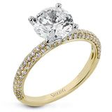 This absolutely exquisite white gold engagement ring dazzles the eye with round white diamonds.