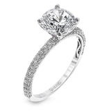 This absolutely exquisite white gold engagement ring dazzles the eye with round white diamonds.