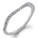 Featuring a delicately twisted shank, this brilliant white gold engagement ring and complimentary wedding band are set with .55 ctw of round cut white diamonds.