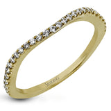 Featuring a delicately twisted shank, this brilliant white gold engagement ring and complimentary wedding band are set with .55 ctw of round cut white diamonds.