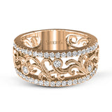 This vintage-inspired 18k white gold band features a detailed, floral design bordered by .52 ctw of white round brilliant diamonds.