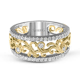 This vintage-inspired 18k white gold band features a detailed, floral design bordered by .52 ctw of white round brilliant diamonds.