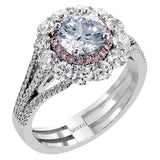 This lovely white gold contemporary ring features a dazzling halo of .10 ctw pink diamonds accented by 1.13 ctw round cut white diamonds.