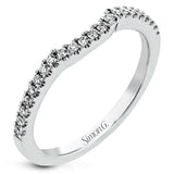 Featuring a brilliant halo setting, this contemporary white gold ring is set with 1.35 ctw glistening round cut white diamonds.