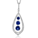 This 18k white gold pendant has an elegant, vintage-inspired design set with .37 ctw of white diamonds. Three gorgeous sapphires hang in the center, totaling 1.51 ctw.