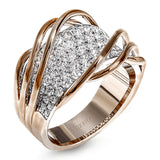 This unique two-toned ring design contains 1.40 ctw of white diamonds pave set in to 18k white gold, overlaid by organic bands of 18k rose gold.