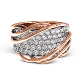 This unique two-toned ring design contains 1.40 ctw of white diamonds pave set in to 18k white gold, overlaid by organic bands of 18k rose gold.