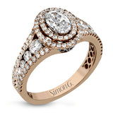 Featuring an exquisite contemporary design, this white gold engagement ring features an eye-catching oval double halo complemented by .68 ctw of round cut white diamonds.