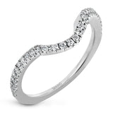 Featuring an exquisite contemporary design, this white gold engagement ring features an eye-catching oval double halo complemented by .68 ctw of round cut white diamonds.