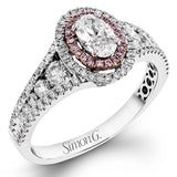 Featuring an exquisite contemporary design, this white gold engagement ring features an eye-catching oval double halo complemented by .68 ctw of round cut white diamonds.