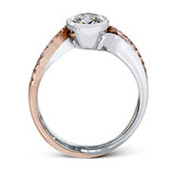 This modern wedding set is a bold choice with a crisscrossing design of 18k white and rose gold set with .26 ctw of white diamonds.