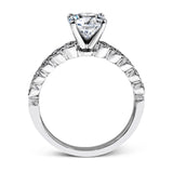 This engagement and wedding band set combines old and new with 1.09 ctw of round brilliant diamonds bezel set into 18k white gold, accented with vintage-inspired milgrain.