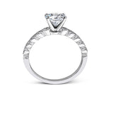 This engagement and wedding band set combines old and new with 1.09 ctw of round brilliant diamonds bezel set into 18k white gold, accented with vintage-inspired milgrain.
