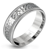 This stunning contemporary platinum men's wedding band features a hammered center column outlined dual milgrain edges for an eye-catching design.