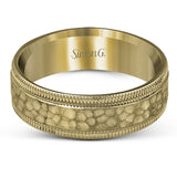 This stunning contemporary platinum men's wedding band features a hammered center column outlined dual milgrain edges for an eye-catching design.