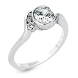 This distinctive, swirling ring design is set with .19 ctw and holds the center stone in a partial bezel setting.