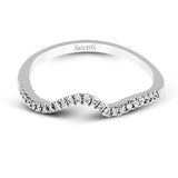 This distinctive, swirling ring design is set with .19 ctw and holds the center stone in a partial bezel setting.