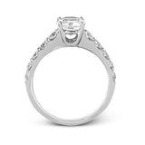 Simple yet dazzling, this white gold engagement ring features .89 ctw of round white diamonds set into the shank.
