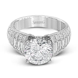 This significant engagement ring is sure to make a statement with 1.13 baguette diamond side stones outlined my .98 ctw of princess cut diamonds.