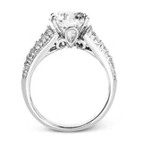 This significant engagement ring is sure to make a statement with 1.13 baguette diamond side stones outlined my .98 ctw of princess cut diamonds.