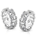 These traditional white gold hoop earrings reflect a romantic floral openwork design accented with .37 ctw of shimmering white diamonds.