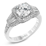 This design is a modern take on a classic design, with .29 ctw of round diamonds set into its halo and sides, and .31 ctw of baguette diamonds flanking the center stone.