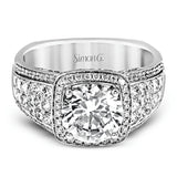 This romantic white gold contemporary ring is accentuated by .25 ctw of glistening round cut white diamonds and .94 ctw of princess cut diamonds.