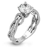 This impressive contemporary two-tone engagement ring features a unique twisting design on the shank, which is complemented by .17 ctw of round cut white diamonds.