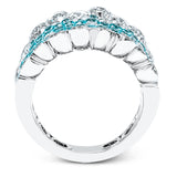 Presenting a dazzling contemporary design, this white gold ring is set with 2.96 ctw of stunning white diamonds and 1.43 ctw eye-catching Paraiba tourmaline stones.