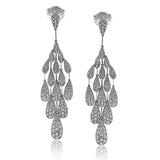 Set in white gold, this dazzling chandelier style contemporary earrings feature 3.16 ctw of shimmering white diamonds to create a completely eye-catching effect.