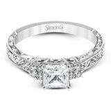 Featuring a dazzling vintage design, this romantic white gold engagement ring is highlighted by .15 ctw of striking white diamonds.