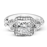 The lovely vintage design of this impressive white gold ring is emphasized by .27 ctw sparkling round cut white diamonds.