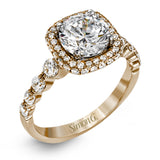The delicate design of this classic white gold engagement ring features a sparkling pave halo accented with .86 ctw of shimmering round cut white diamonds.