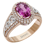 18KWR right hand ring with an intricate design along the shank has a diam halo .55 ctw, and an oval KNZT 5.89 ctw.
