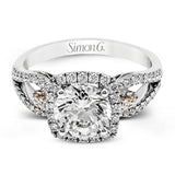 The delicate romantic design of this vintage inspired white and rose gold engagement ring and wedding band set is accentuated by .45 ctw of white diamonds and .08 ctw of pink diamonds.