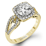 The delicate romantic design of this vintage inspired white and rose gold engagement ring and wedding band set is accentuated by .45 ctw of white diamonds and .08 ctw of pink diamonds.