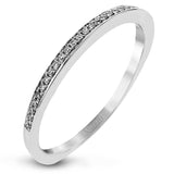 This impressive modern white gold ring features .18 ctw of glimmering round cut white diamonds accentuated by .97 ctw princess cut diamonds.